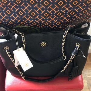 Tory Burch triple compartment tote shoulder bag.